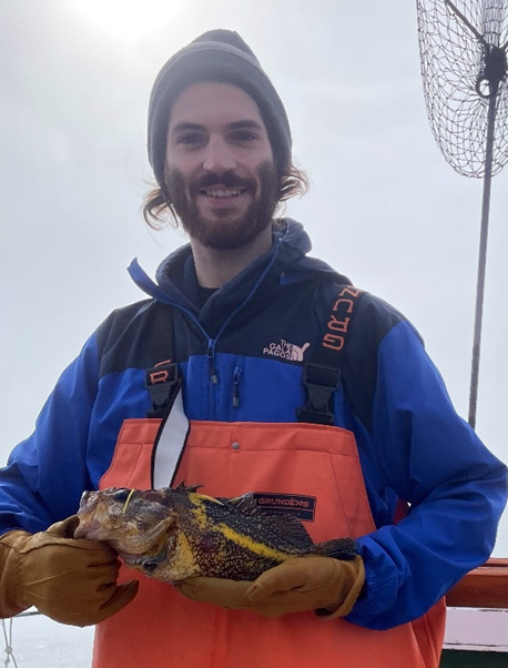 Zeke is holding a china rockfish (Sebastes nebulosus) captured on a research expedition in Bodega Bay with the California Collaborative Fisheries Research Program. Photo Credit: Francine De Castro